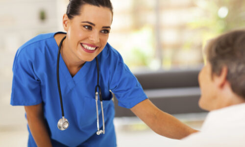 nurse-2 friendly young nurse talking to senior patient